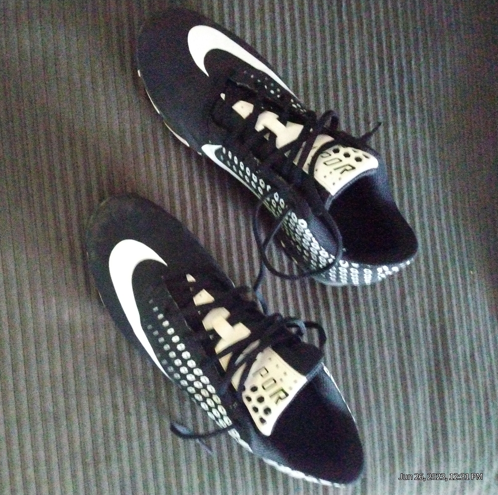 Nike cleats, size 9.5